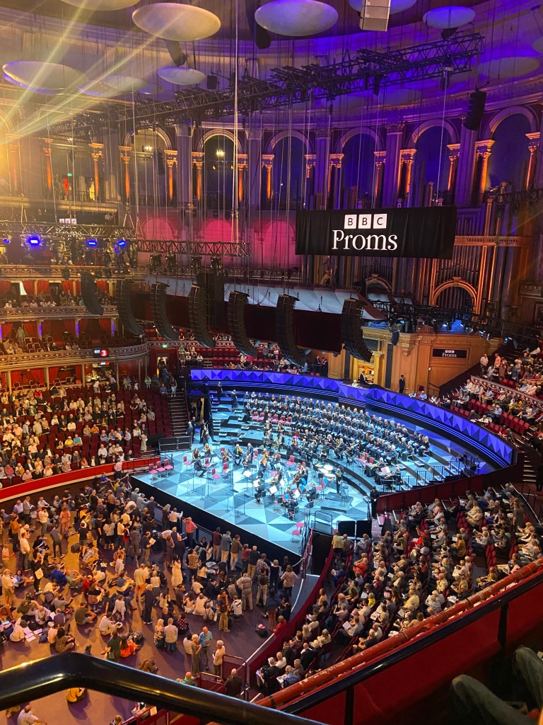 An orchestral perform in an auditorium. 